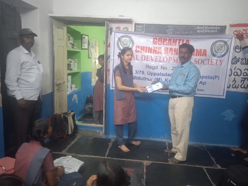 https://1ngo.sgp1.digitaloceanspaces.com/media/gorantlasociety/1NGO-00883-Gorantla Chinna Rangamma Rural Development Society-Activities-Books Distribution Program (5).jpeg